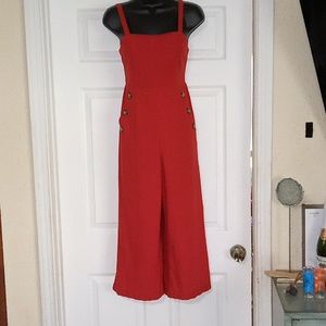 T•I•M•I•N•G, burnt orange overalls size small